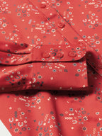 Red printed reata shirt front with button placket and rolled cuff detail