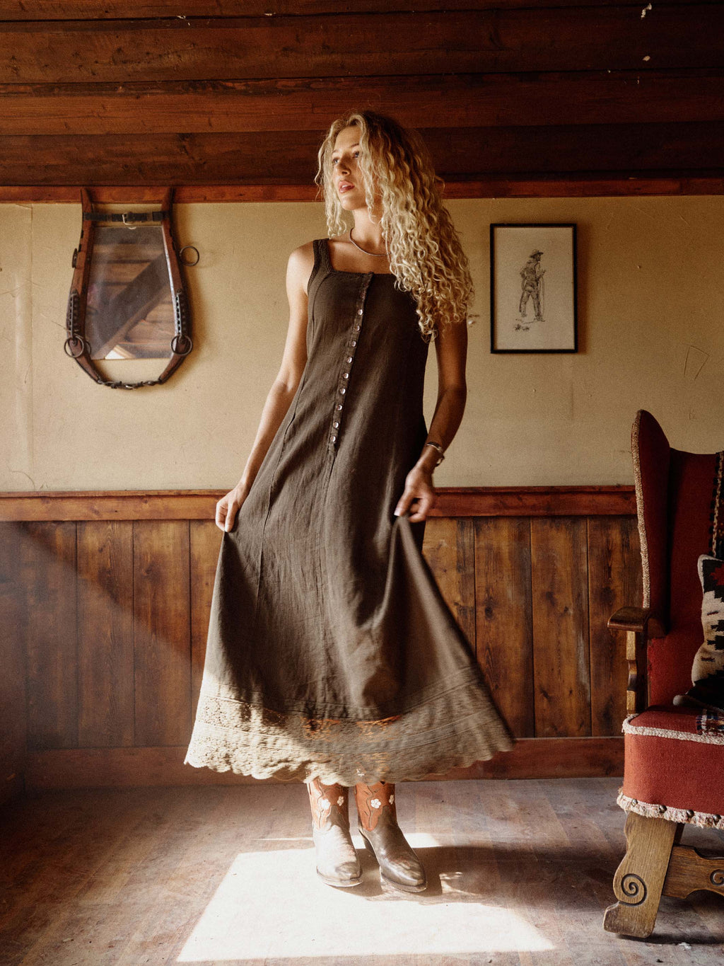 Olive sleeveless dress with full skirt and lace-trimmed hem