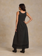 Washed black sleeveless maxi dress back view with lace-trim hem