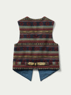Women's patterned wool vest with navy, red, and yellow tribal stripes, button front