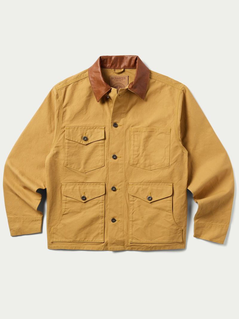 Suntan brush jacket with front flap pockets and snap button closure