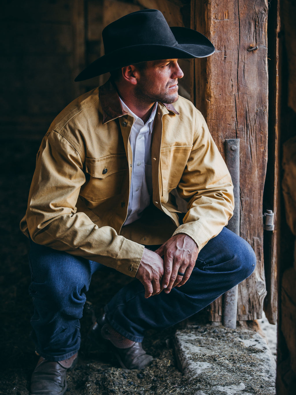 Suntan brush jacket on a cowboy with snap front and flap chest pockets