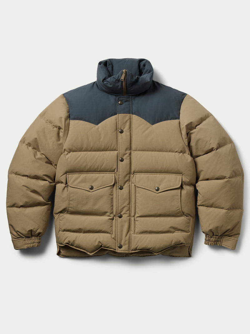 Camel and dark navy down jacket with hood, front placket, and quilted insulation