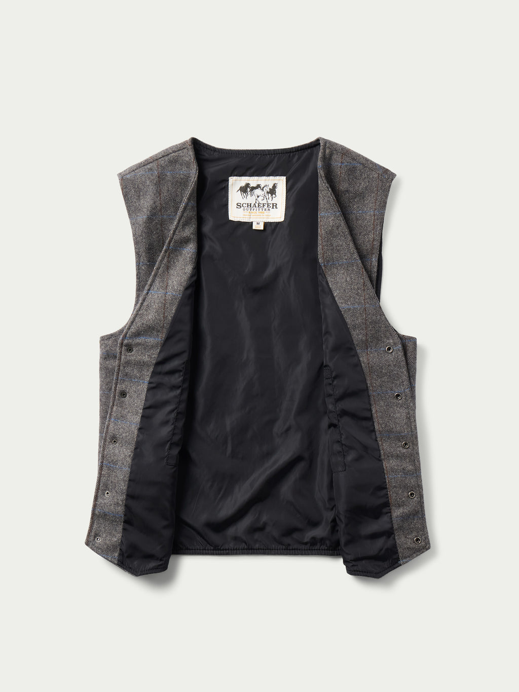 McAllin wool vest interior showing black satin lining and button placket