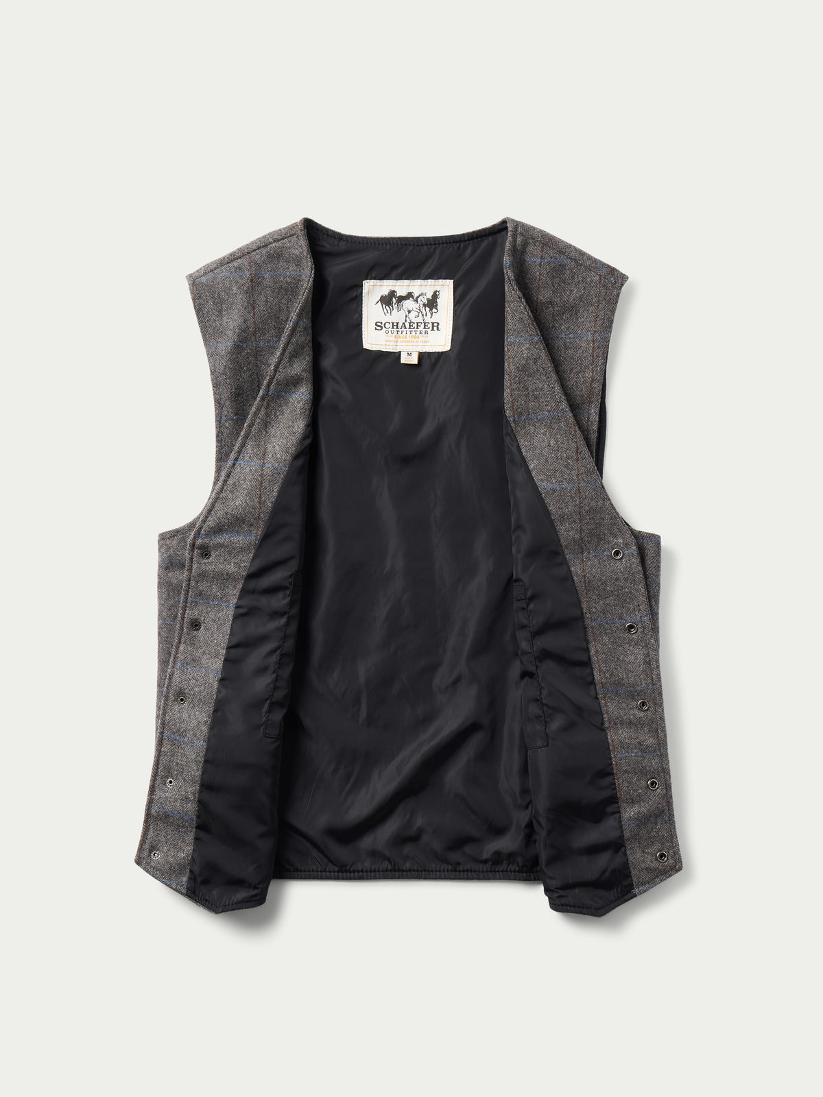 McAllin wool vest interior showing black satin lining and button placket