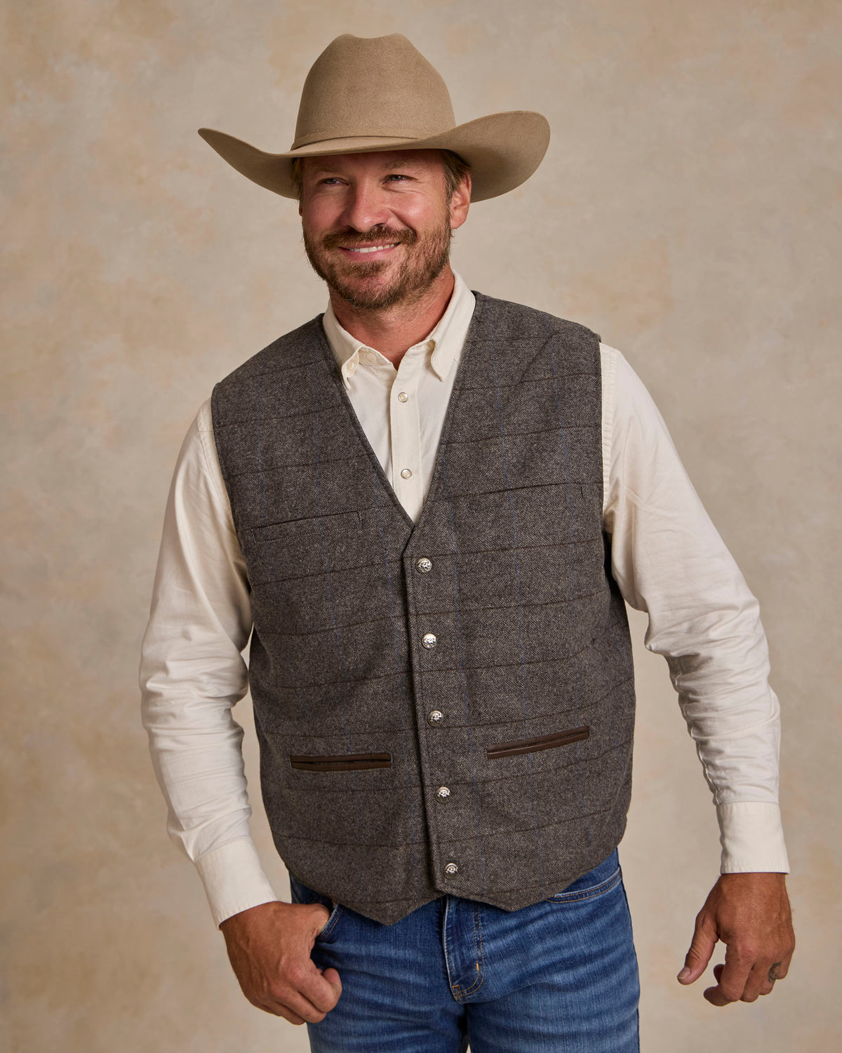 McAllin wool vest front view in heather gray windowpane plaid with chest pockets