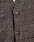 Heather gray windowpane wool vest with V-neck, button front, and flap pockets