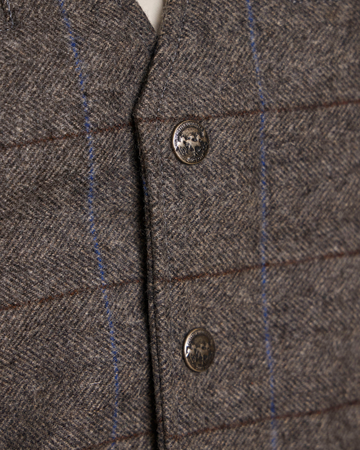 Heather gray windowpane wool vest with V-neck, button front, and flap pockets