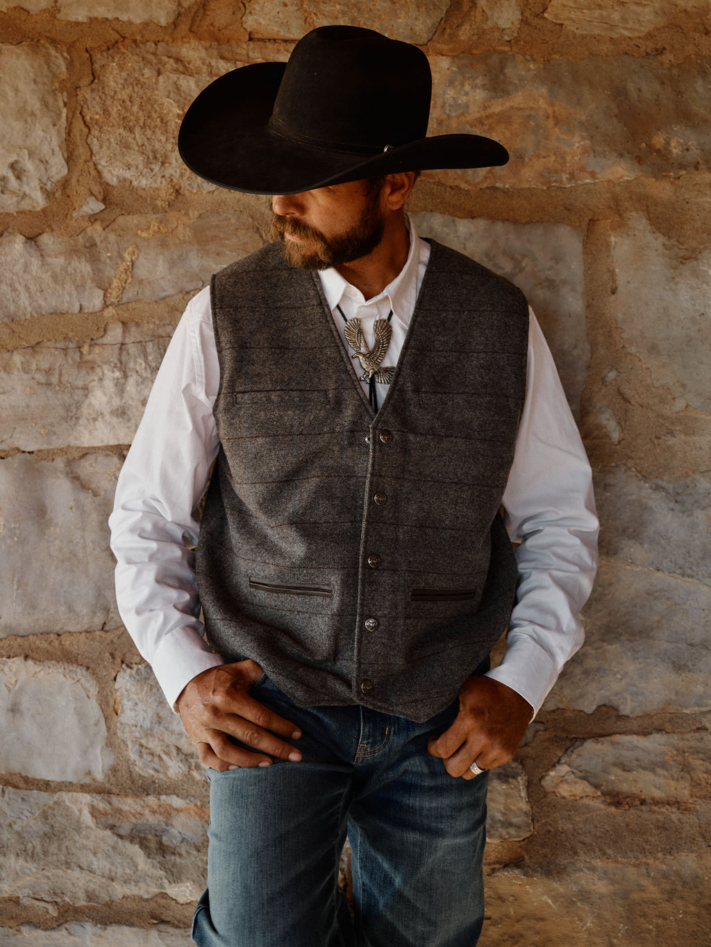 Heather gray windowpane wool vest with button front and two chest-level pocket flaps