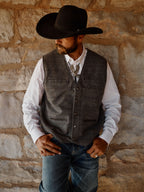 Heather gray windowpane wool vest with button front and two chest-level pocket flaps
