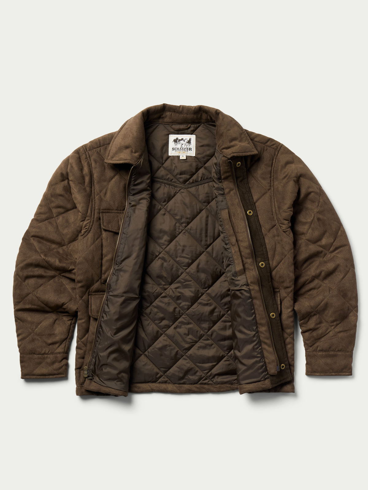 Brown quilted microsuede jacket on model, showing stand collar and snap-front design.
