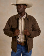 Brown quilted microsuede jacket with stand collar, snap chest pockets, and zip front