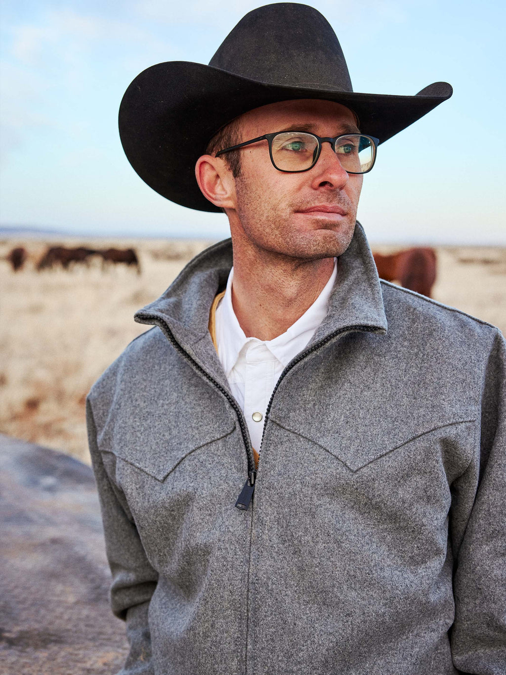 Heather gray wool stand-collar zip jacket on model with cowboy hat