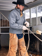 Heather gray wool full-zip jacket worn by model holding reins