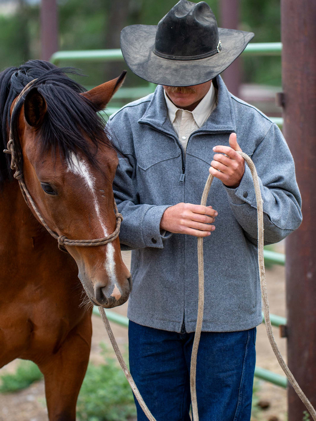 Heather gray wool arena jacket with stand collar, front zipper, and flap pockets