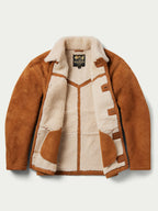 Buckskin suede jacket with cream shearling lining and decorative patch-style panels