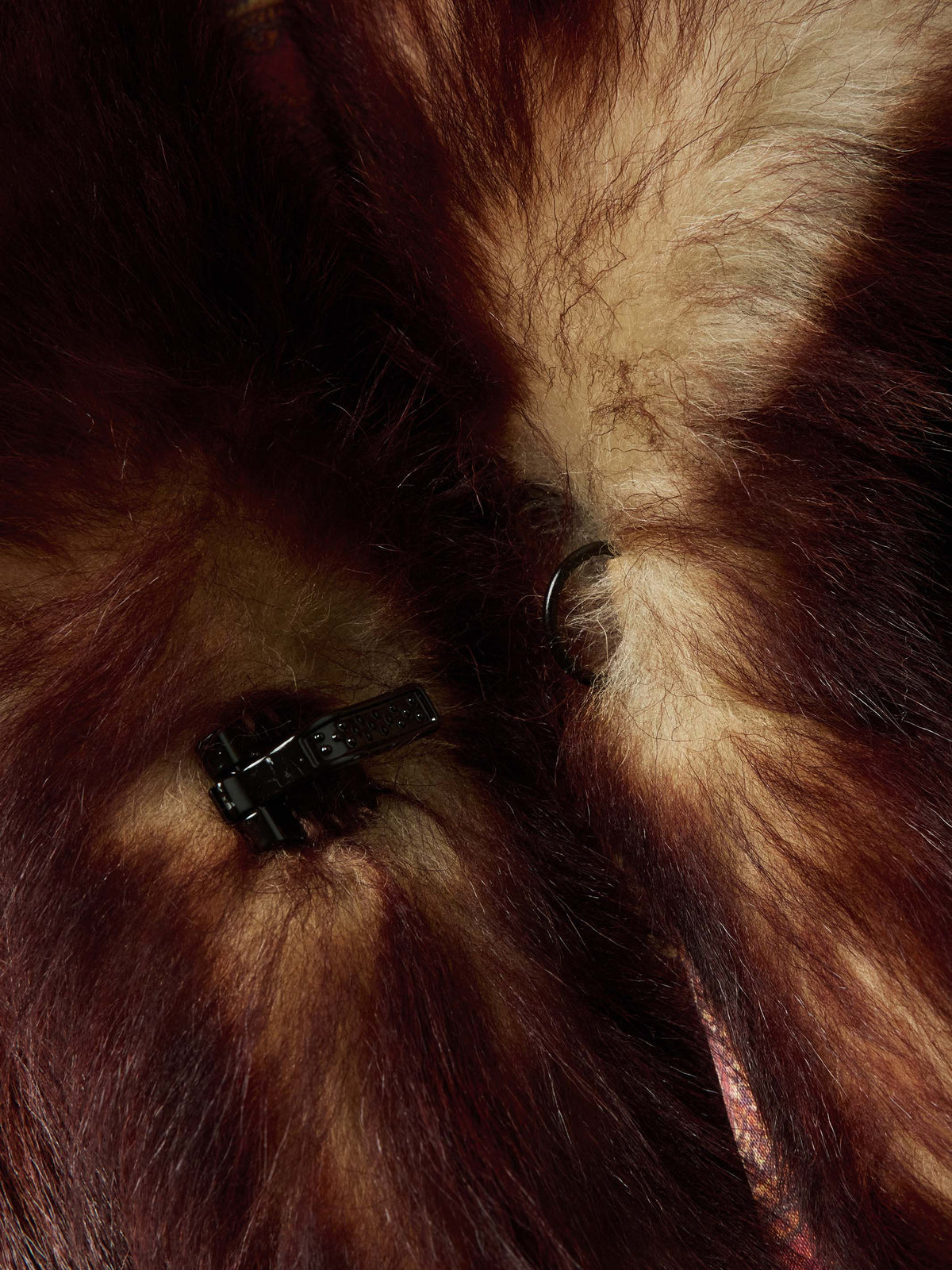 Women's Toscana jacket auburn faux fur interior with black snap close-up