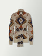 Women's belted sweater front view, cream knit with V-neck geometric pattern and tie.