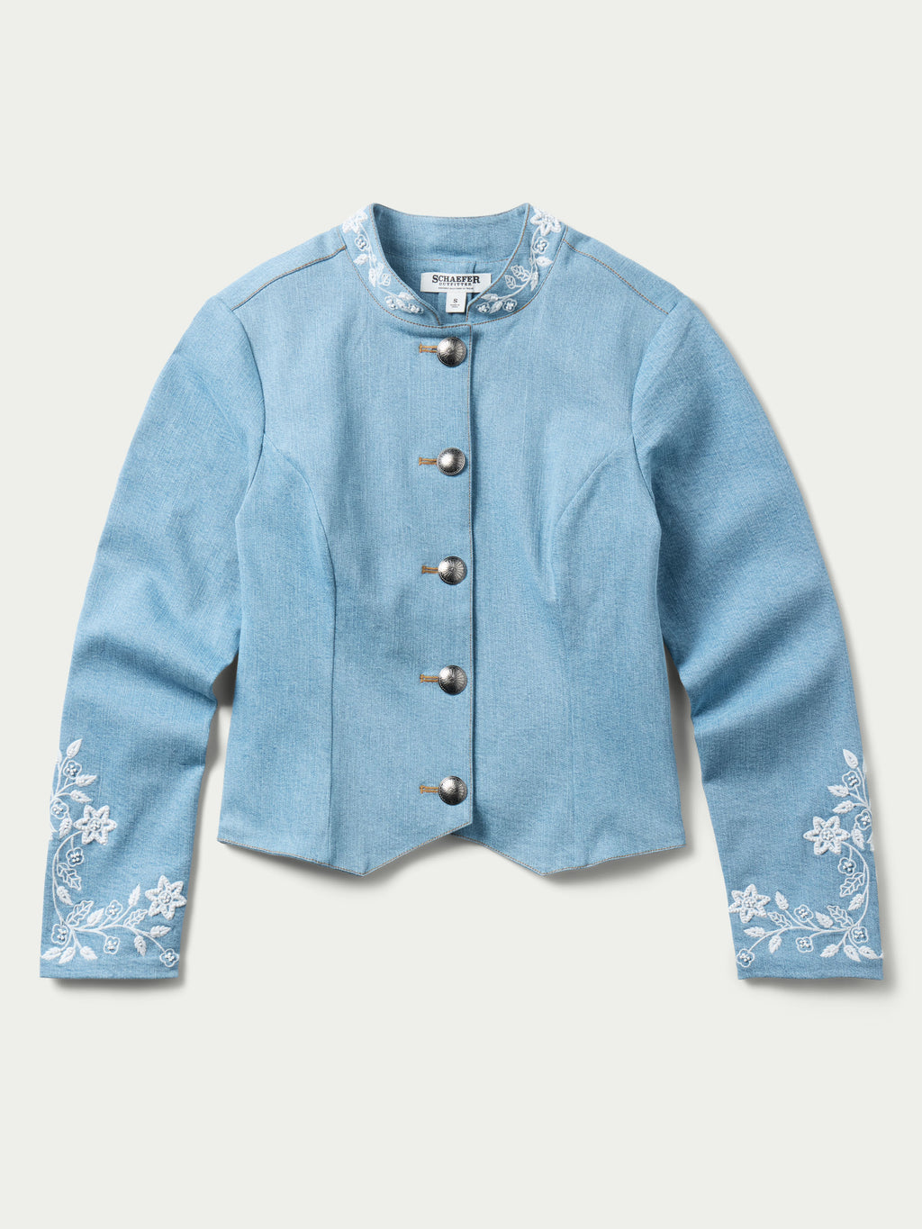 Light wash denim cropped jacket with snap front and white floral cuff embroidery