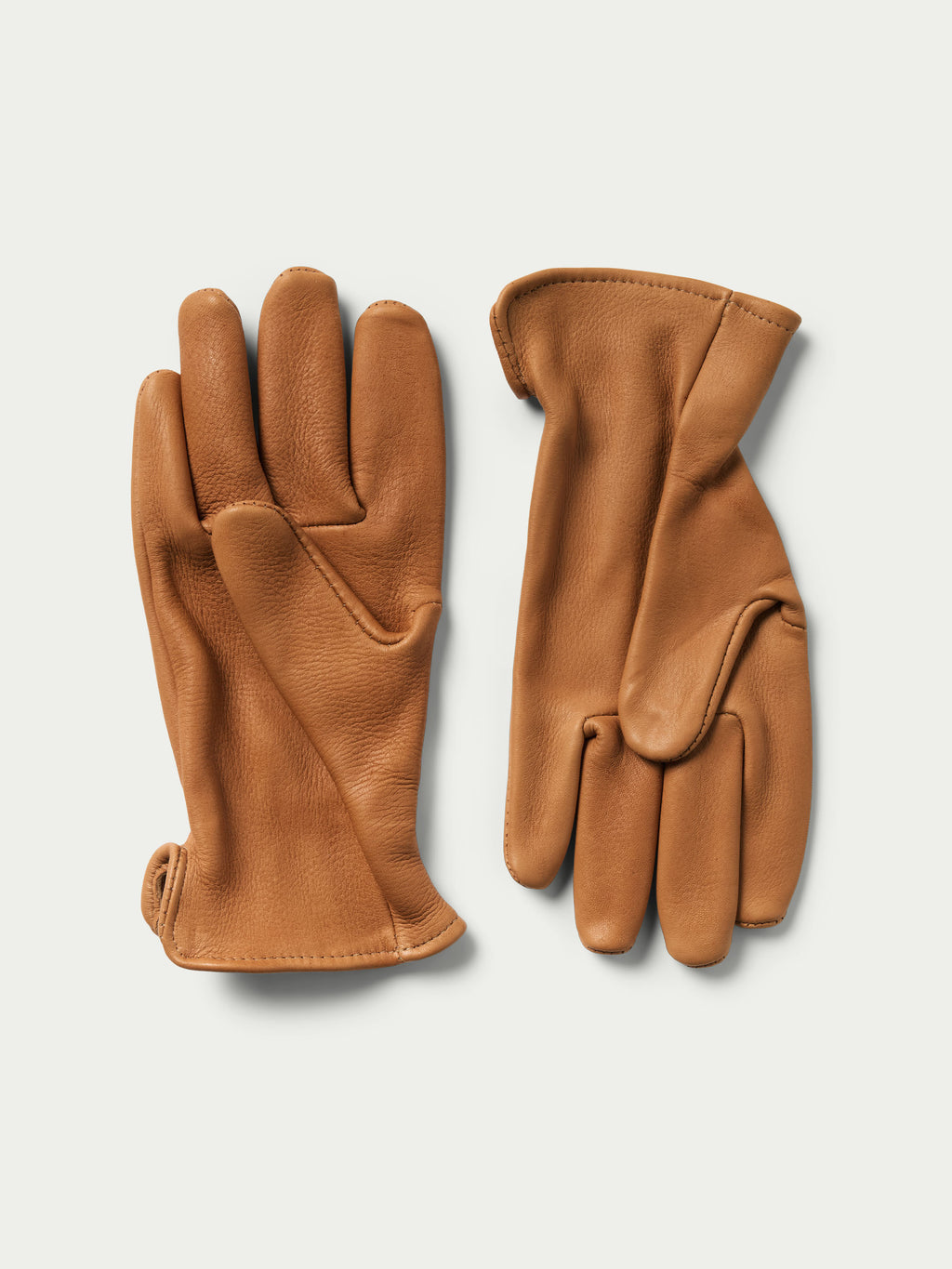 Deerskin gloves pair, saddle tan, with cord pull wrist cuffs