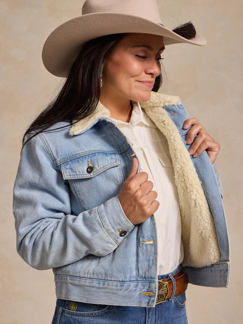Light wash denim jacket with sherpa lining, sherpa collar, button front, chest pockets
