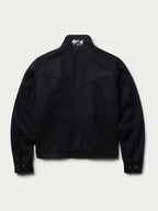 Women's black wool arena jacket, stand collar, back yoke seam, chest logo