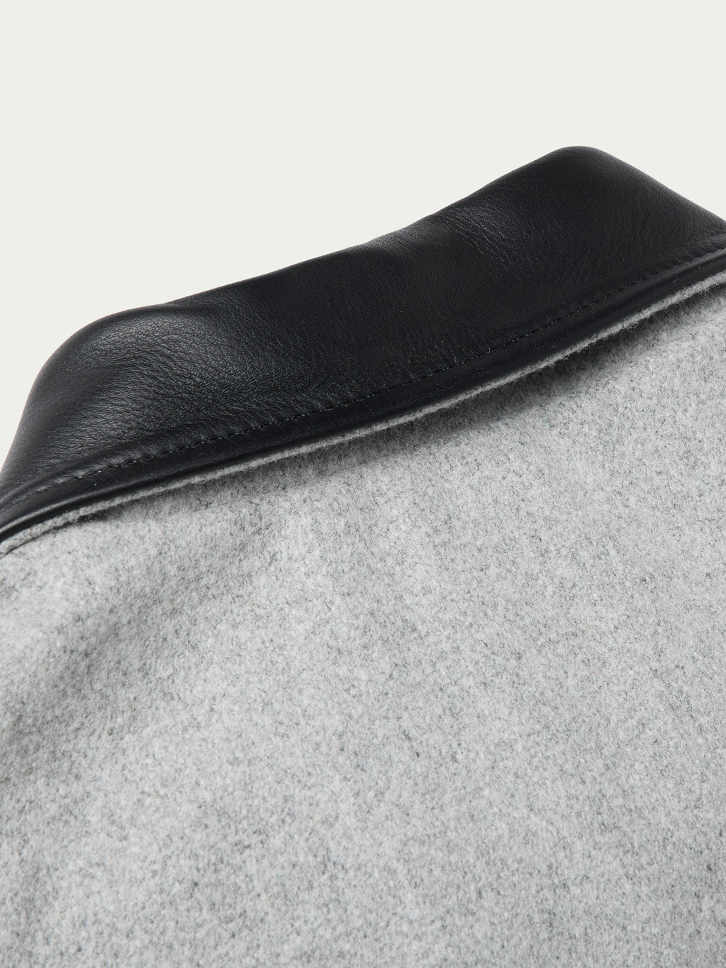 Light gray wool ranch jacket with black leather-look yoke and collar detail