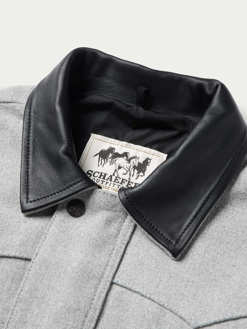 Light gray wool ranch jacket interior with black leather-look collar edge