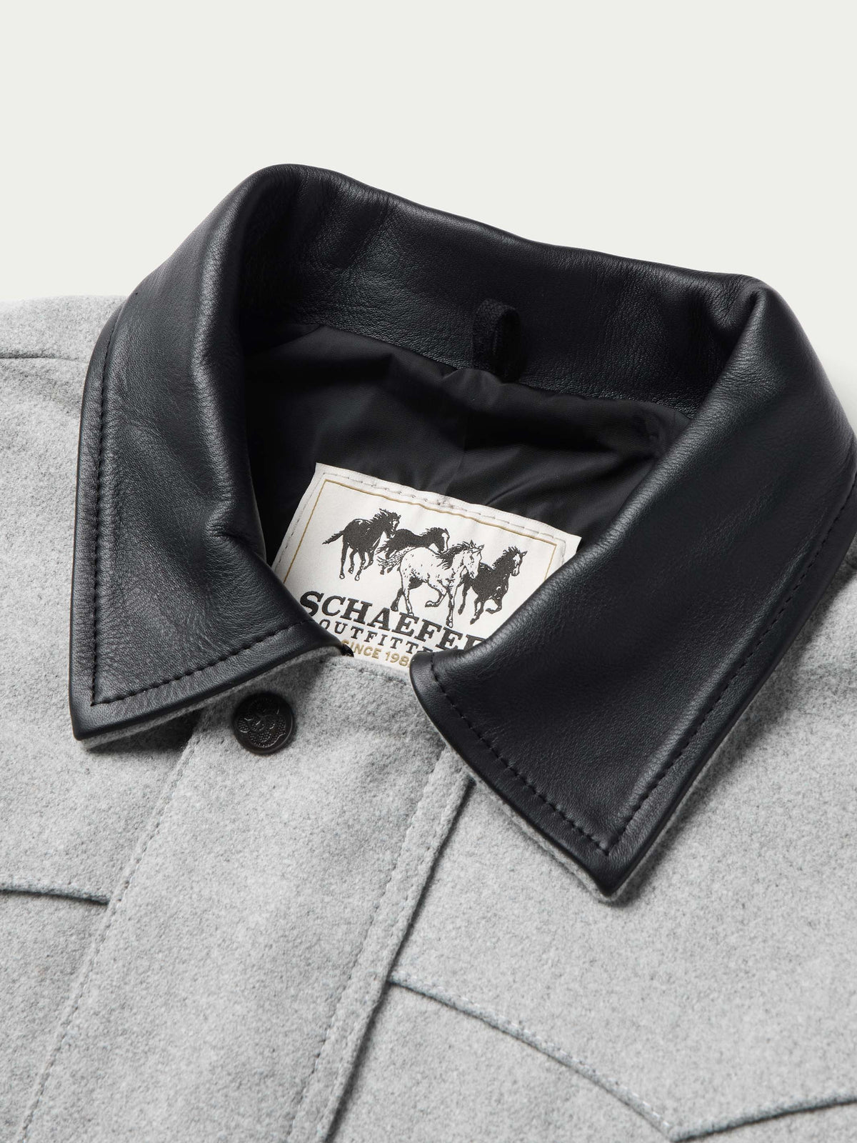 Light gray wool ranch jacket interior with black leather-look collar edge