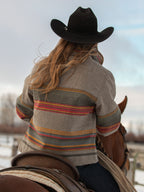 Women’s striped jacket in heather taupe with tan leather-style yoke, back view