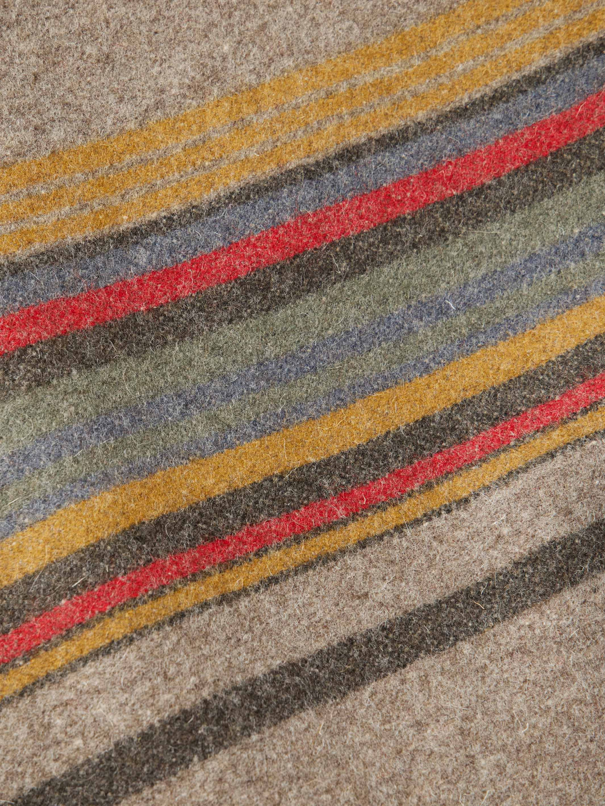 Close-up of taupe striped jacket with multicolor horizontal bands