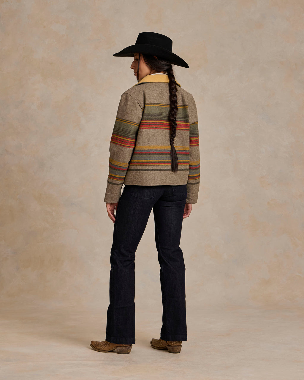 Women’s striped taupe jacket with tan leather-style collar, back view