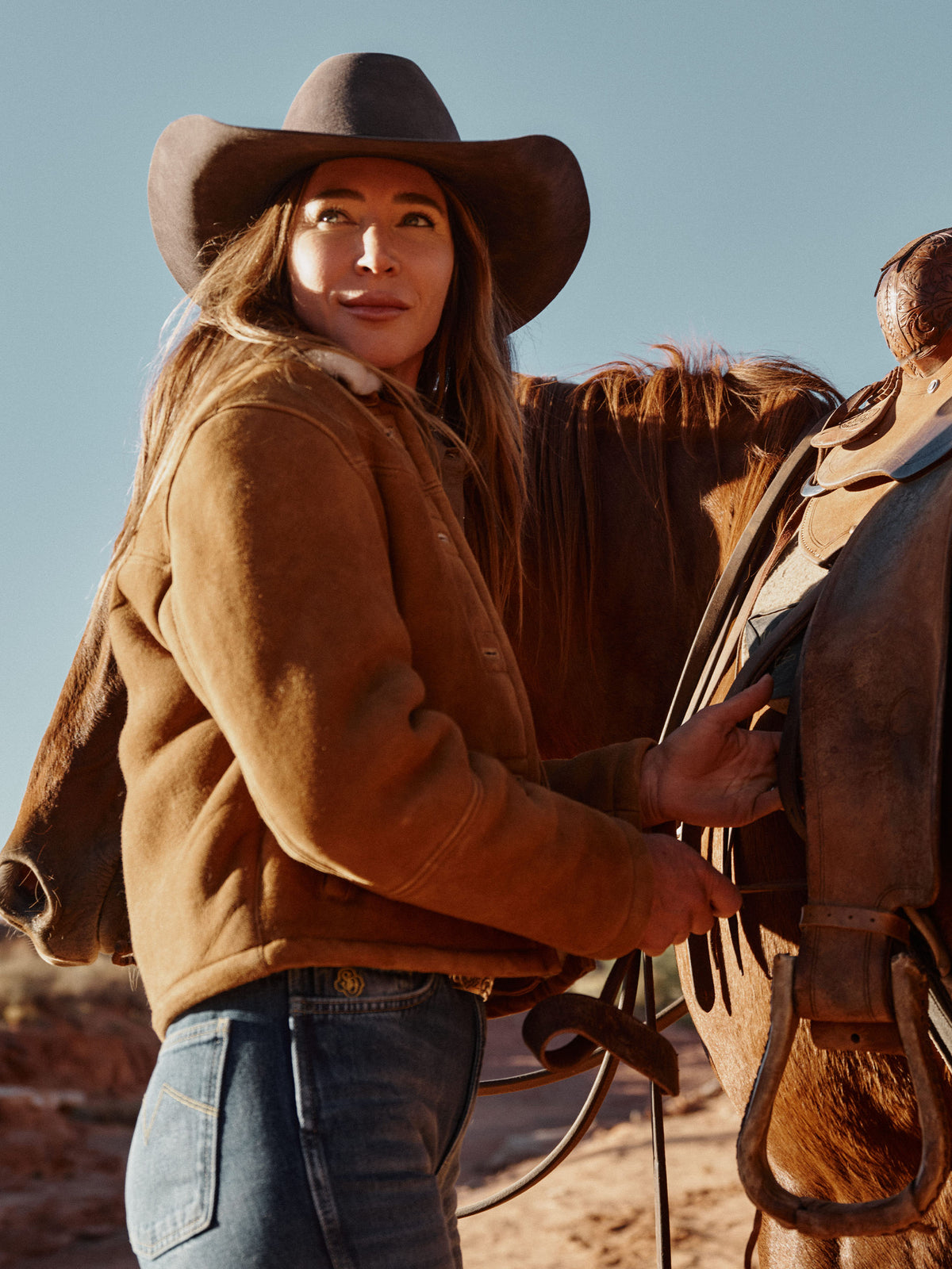 Brown shearling jacket with tan sherpa collar lining and button placket
