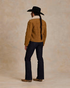 Brown shearling jacket back view with sherpa collar and seam detailing