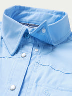 Women’s blue Western snap shirt collar with button placket and snap front