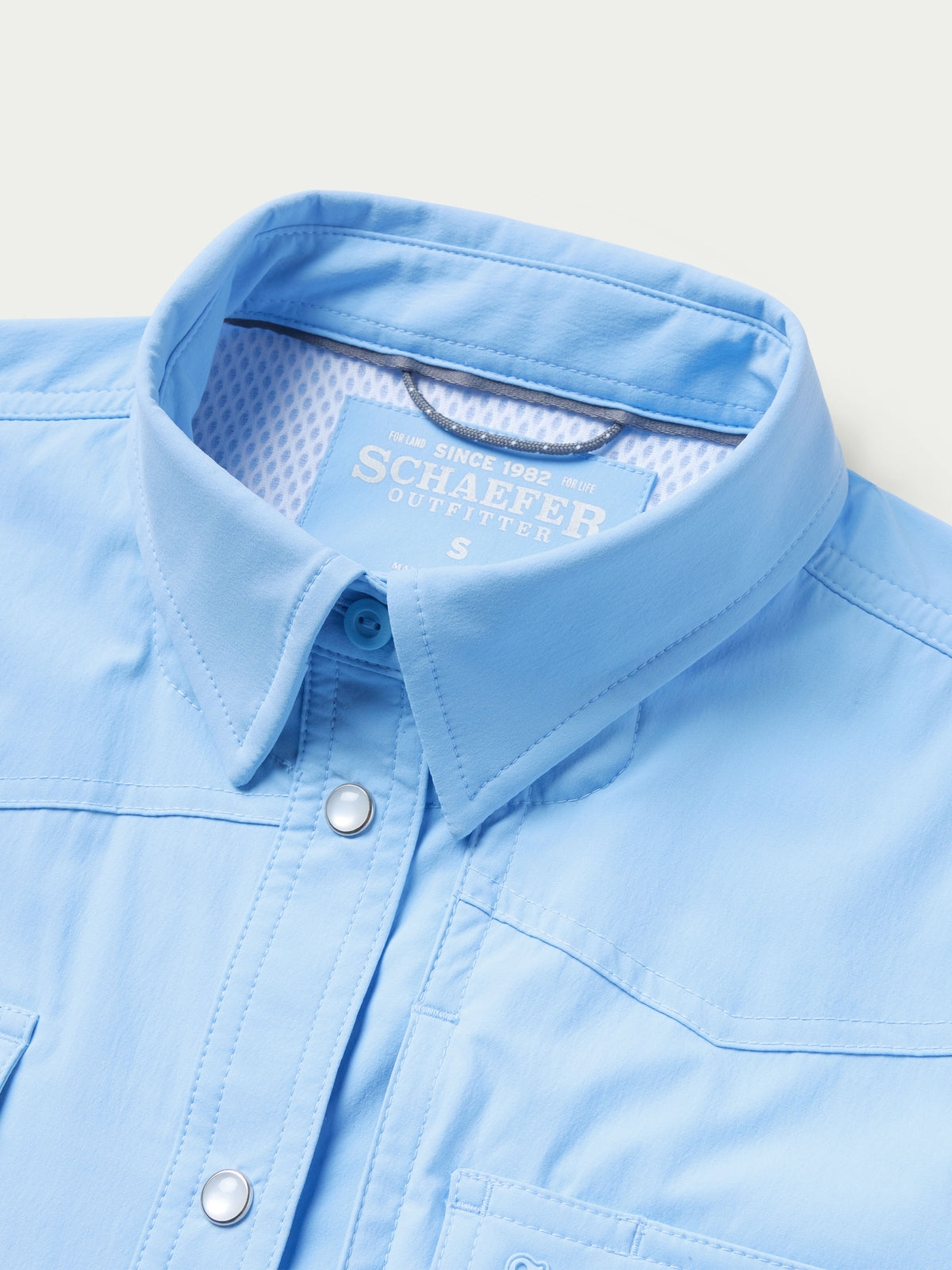 Women’s Western snap shirt with snap placket and lined, structured collar