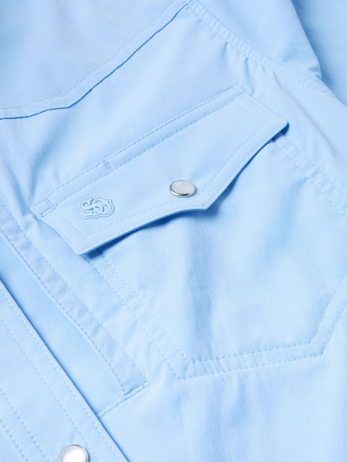Women’s sky blue Western snap shirt chest pocket with flap and metal snap