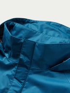 Baltic blue rain jacket hood interior and collar seam detail