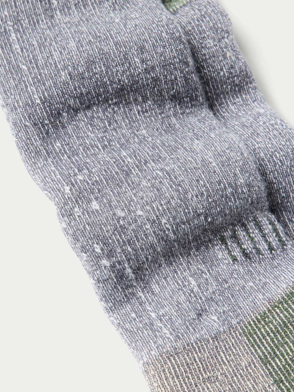 Merino wool boot sock close-up, textured knit and ribbed cuff