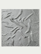 Silver jacquard wild rag fabric close-up with textured swirl pattern