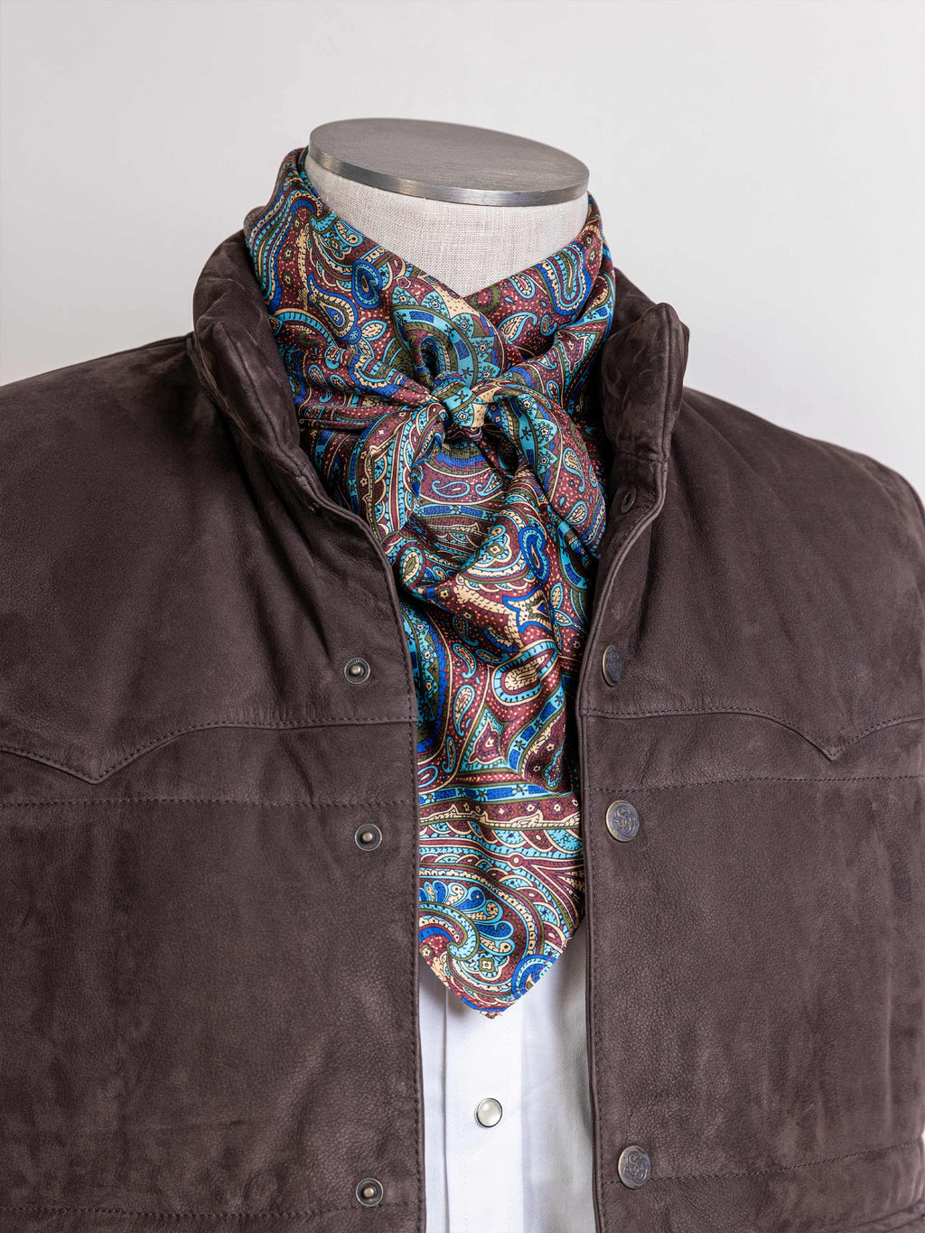 Paisley wild rag scarf in burgundy, blue, and olive swirl pattern
