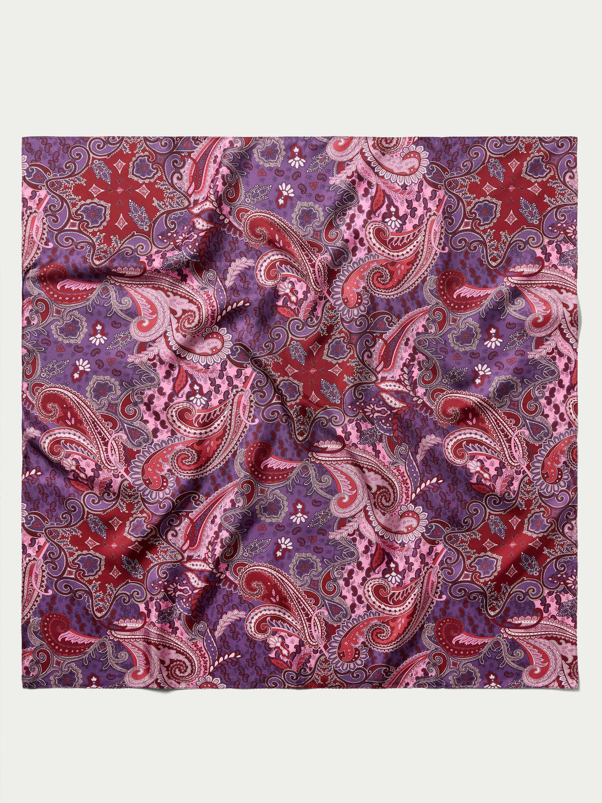 Paisley-pattern wild rag scarf fabric swatch with red, purple, and burgundy swirls