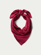 Burgundy jacquard wild rag scarf looped with a knotted center