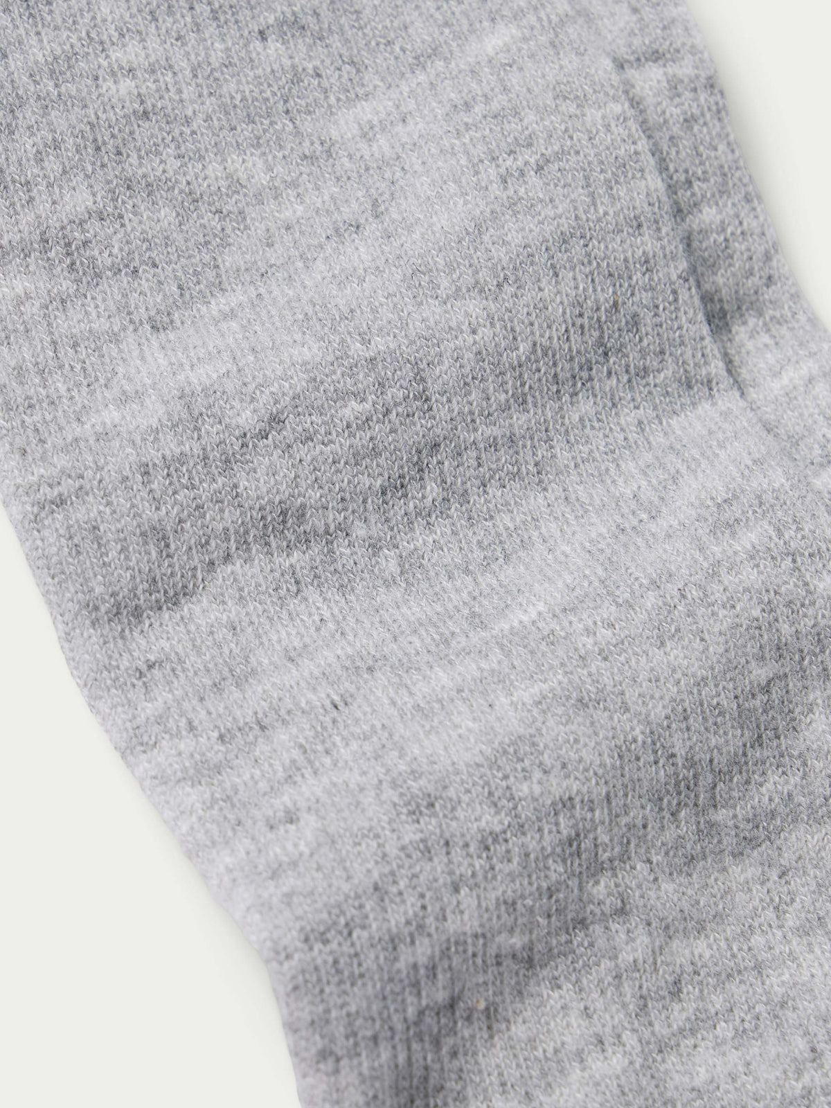 Gray heather boot sock with ribbed knit cuff and textured fabric