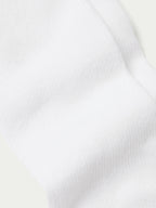 White boot sock with ribbed cuff and smooth knit texture