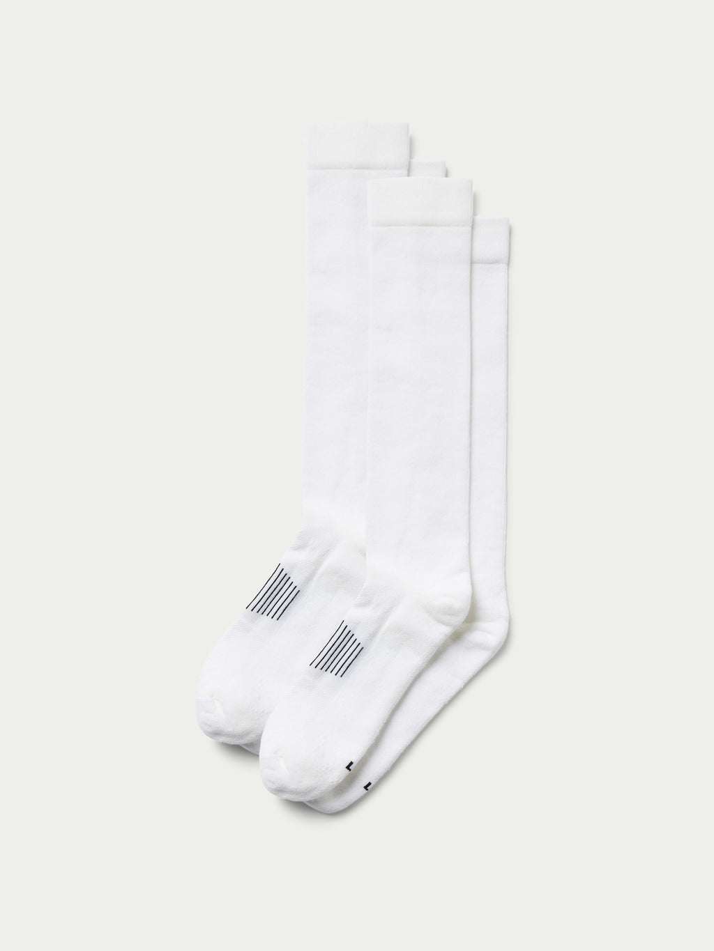 White boot socks with ribbed cuffs and striped logo accents, two-pack