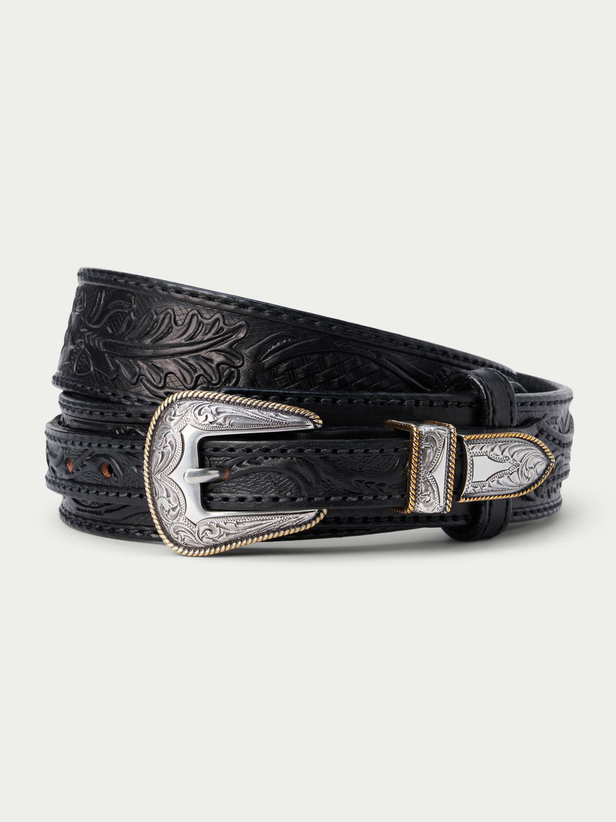 Black western ranger belt with embossed leather and ornate silver buckle
